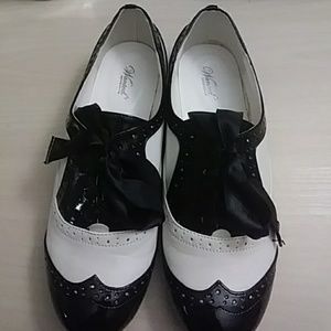 Black patent and white Oxfords